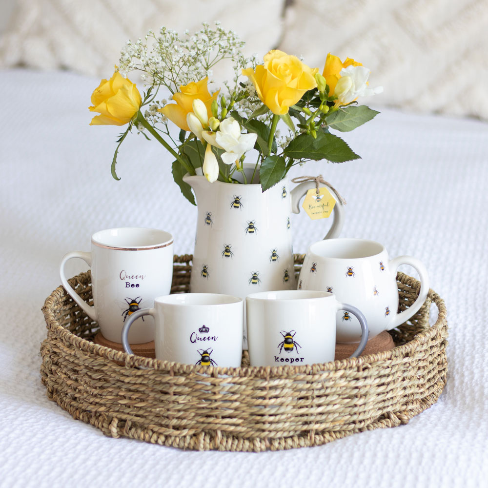 Bee homeware collection including mugs and bee flower jug